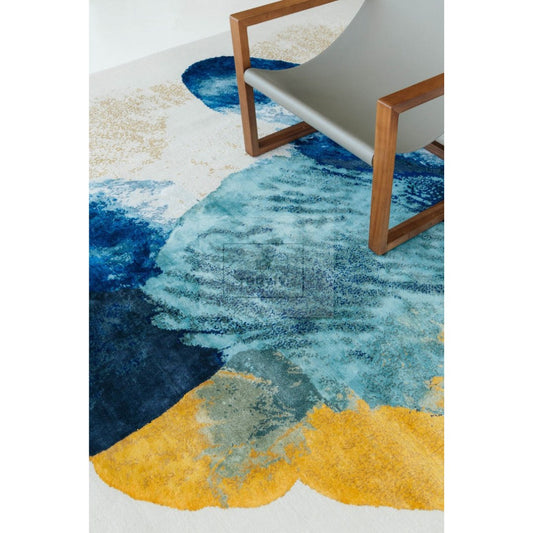 Navy blue and teal watercolor abstract modern hand-tufted wool area rug with ochre accent