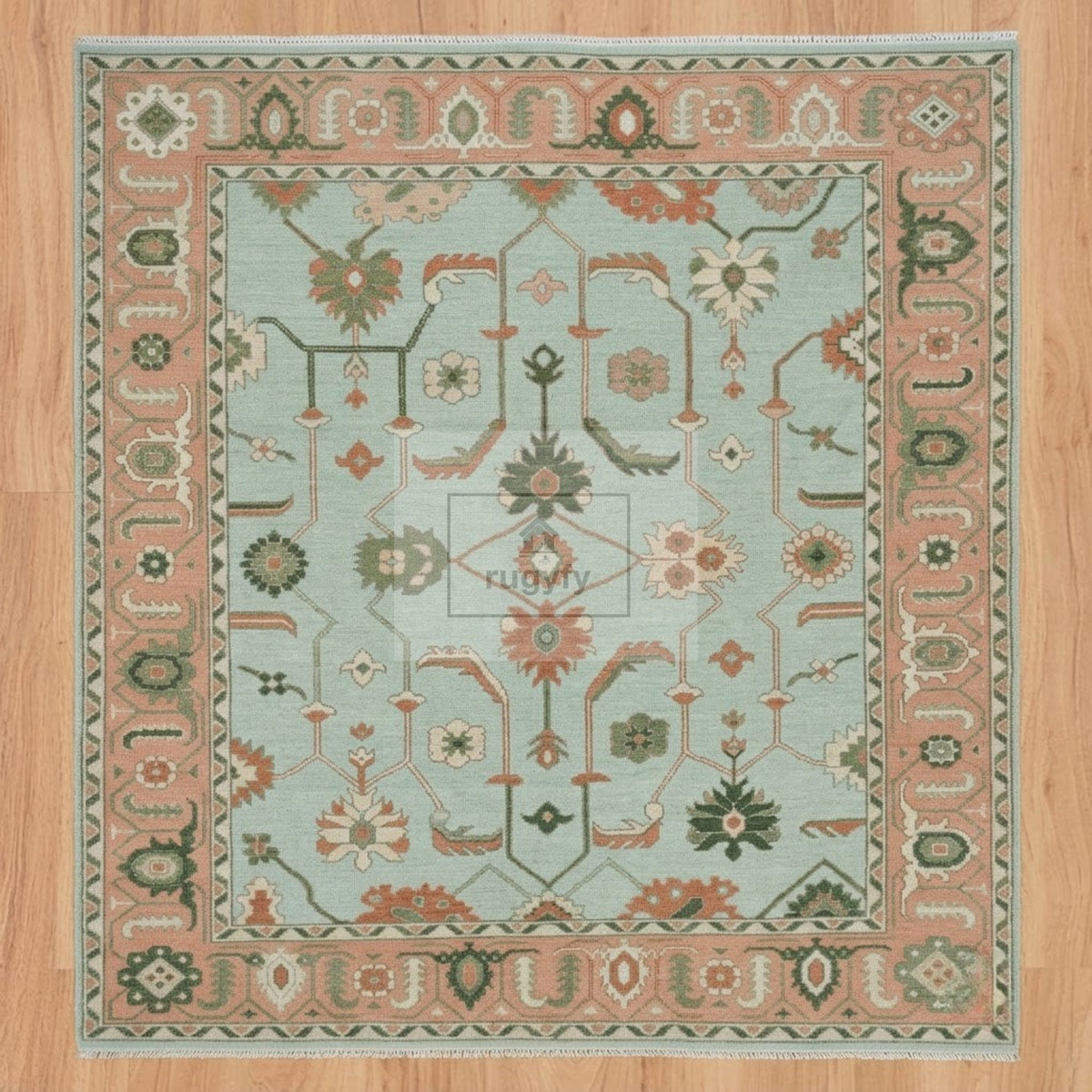 Full view of seafoam aqua and coral peach Sultanabad Oushak rug hand-knotted in New Zealand wool with green palmettes - RUGYFY